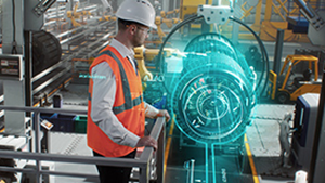 Engineer in safety vest viewing digital twin of aircraft engine, illustrating how aviation MRO software integrates with predictive maintenance and compliance systems.